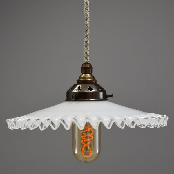 Quintessentially French design coolie light shade with a clear wavy edge