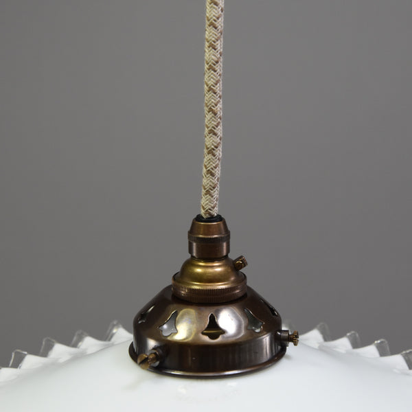 Quintessentially French design coolie light shade with a clear wavy edge
