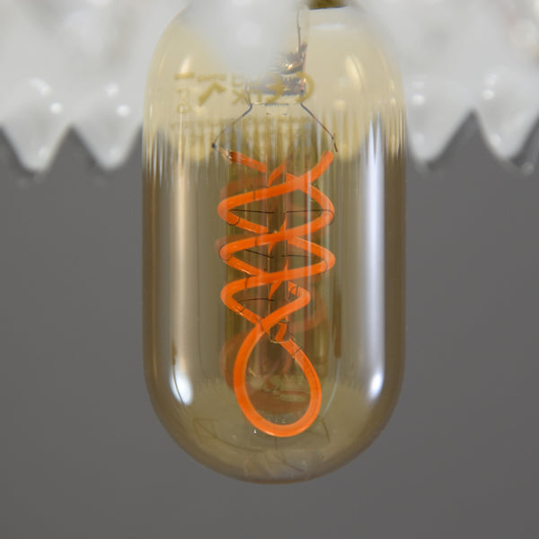 Quintessentially French design coolie light shade with a clear wavy edge