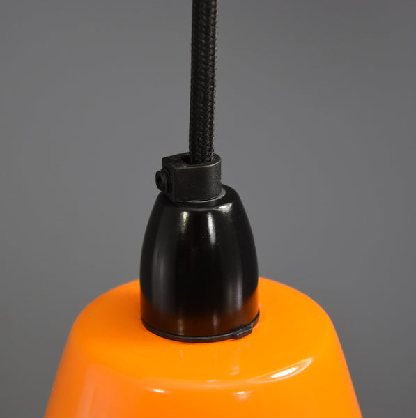 Mid-Century white ribbed ceiling light with orange top