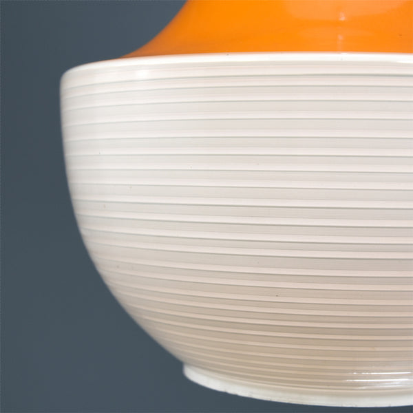 Mid-Century white ribbed ceiling light with orange top