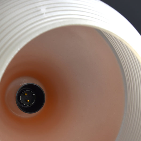 Mid-Century white ribbed ceiling light with orange top