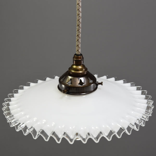 Quintessentially French design coolie light shade with a clear wavy edge