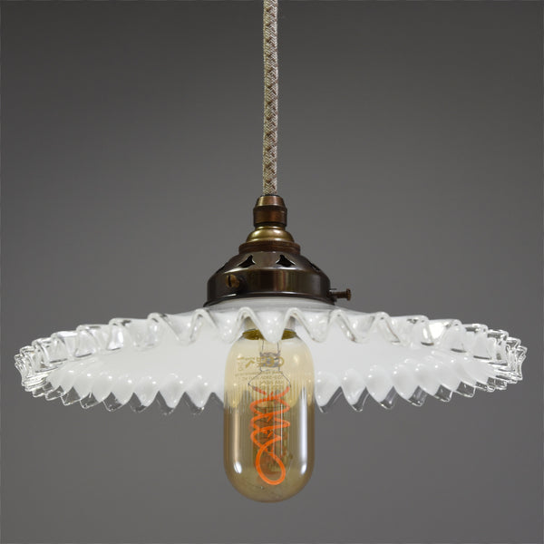Quintessentially French design coolie light shade with a clear wavy edge