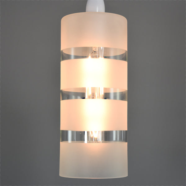 Pair of tall 1970s clear glass pendant lights with frosted banding